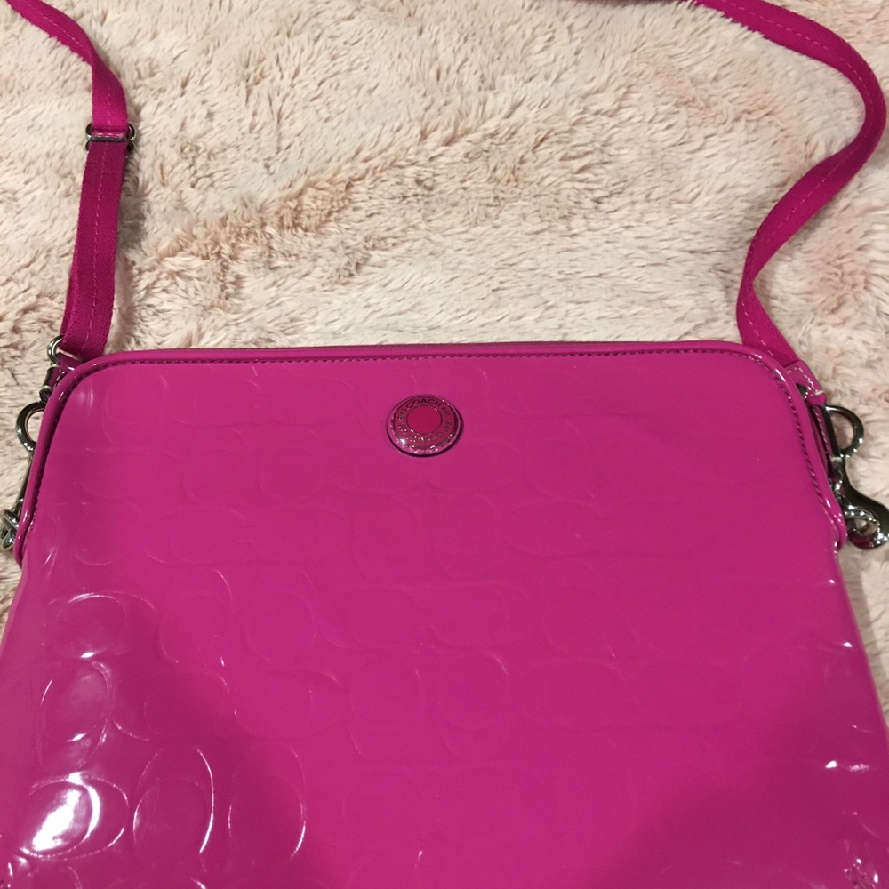 Selling pink coach tablet bag